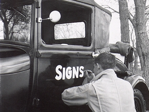 Vintage 1950s garage workshop converted into a sign shop