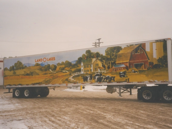 Before-and-after comparison of a traditional 1980s truck versus a pioneering photographic-quality graphic wrap truck